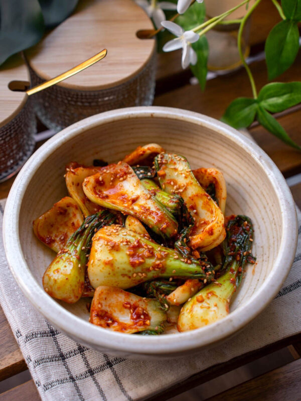 bok choy seasoned in a korean red sauce (bok choy kimchi)