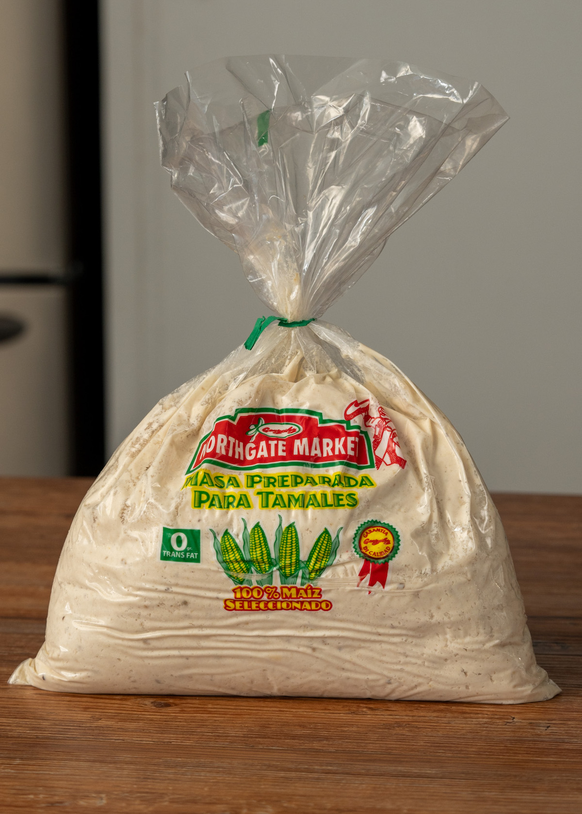 A clear plastic bag filled with prepared masa