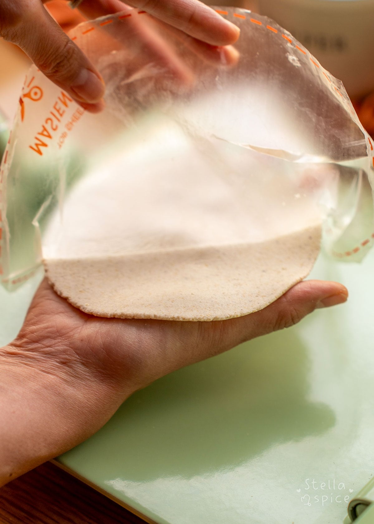 peel plastic wrap off pressed tortilla