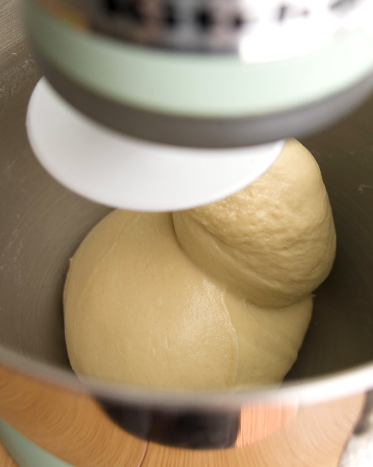dough has formed a ball on the dough hook