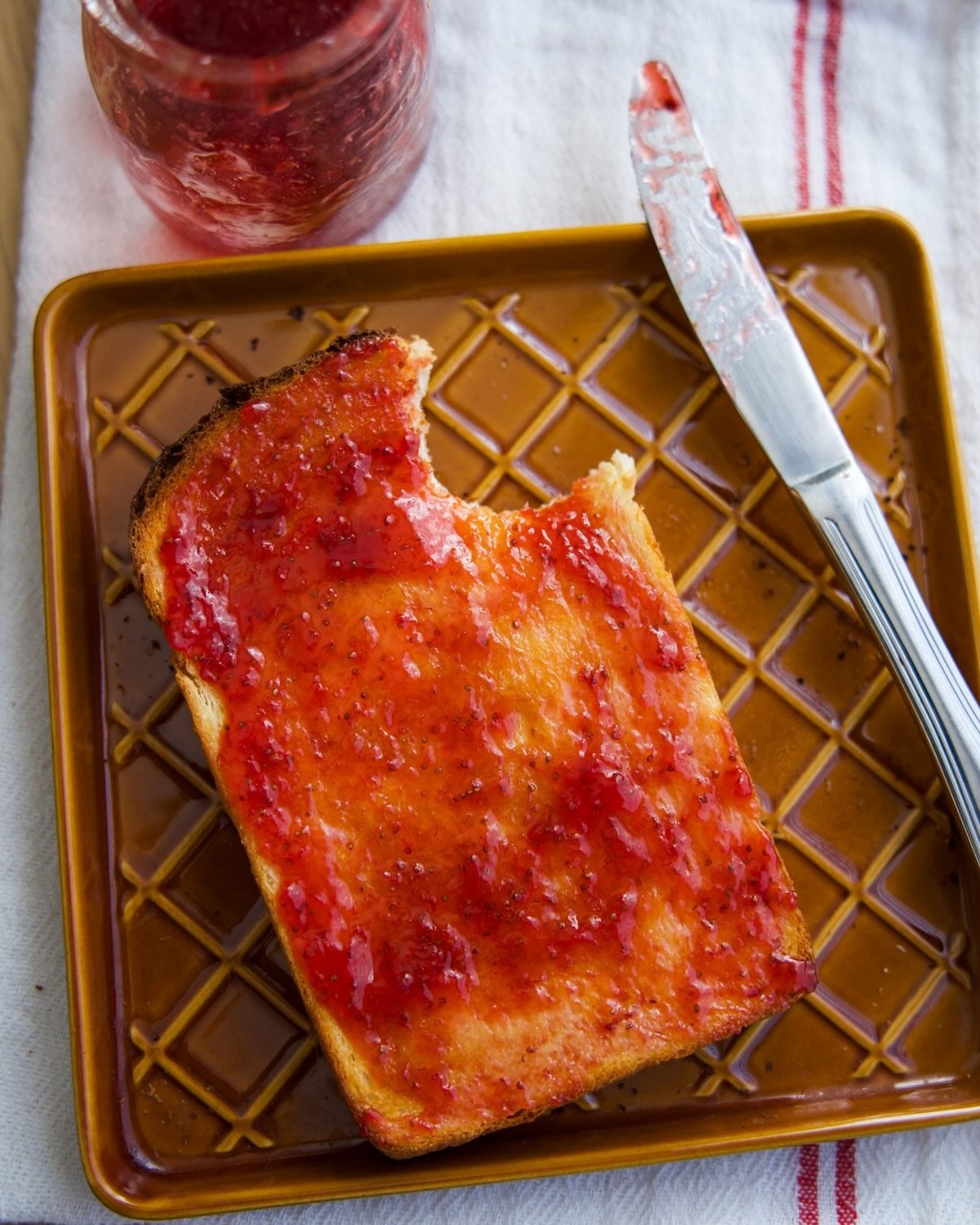 strawberry jam on toasted milk bread